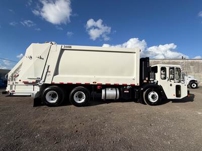 2018 Crane Carrier Company ( CCC ) Heil DuraPack 5000 Body 27 Yards Rear Loader Garbage Truck