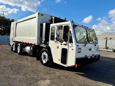 2018 Crane Carrier Company ( CCC ) Heil DuraPack 5000 Body 27 Yards Rear Loader Garbage Truck