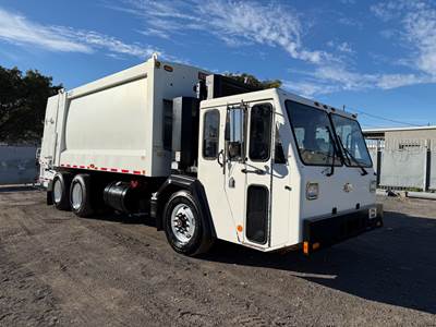 2016 Crane Carrier Company ( CCC ) Heil DuraPack 5000 Body 27 Yards Rear Loader Garbage Truck