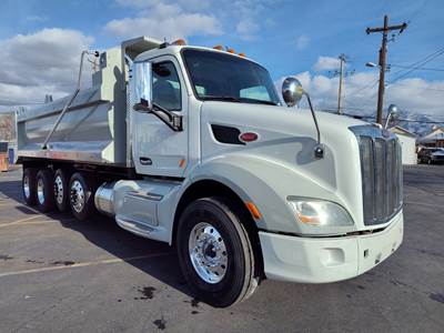 2017 PETERBILT 579 Quad Axle Dump Truck - NEW 20' Dump Body - Lift Axles Tarping System with Speader, Chain Lockers, and more!