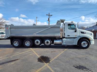 2017 PETERBILT 579 Quad Axle Dump Truck - NEW 20' Dump Body - Lift Axles Tarping System with Speader, Chain Lockers, and more!
