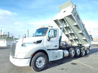 2017 PETERBILT 579 Quad Axle Dump Truck - NEW 20' Dump Body - Lift Axles Tarping System with Speader, Chain Lockers, and more!