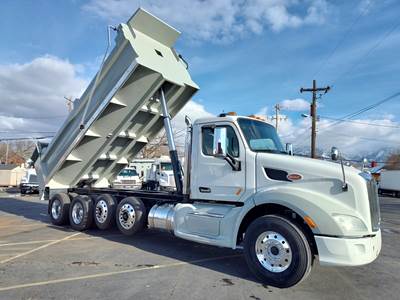 2017 PETERBILT 579 Quad Axle Dump Truck - NEW 20' Dump Body - Lift Axles Tarping System with Speader, Chain Lockers, and more!