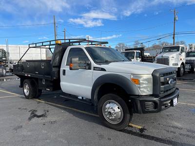 2016 Ford F550 SD 4WD XL Flatbed Truck, Ladder Rack & Compartments and more!