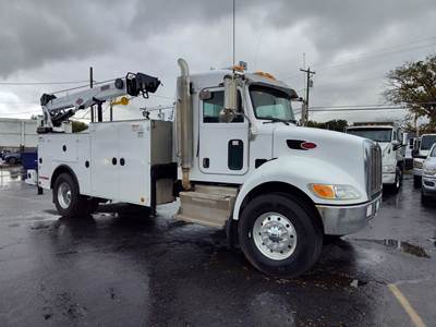 2014 Peterbilt 337 Extended Cab Service Truck 10,000 IMT Crane Hydraulic Air compressor and out riggers, ISL Cummins Re-Manufactured.