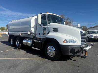 2011 MACK CXU613 PINNACLE, Tandem Axle, 4,000 lb. Water Tank Body and Sprayers.