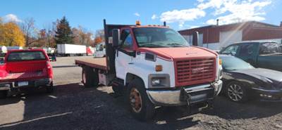 GMC C6500 MD 4X2 Flatbed Truck