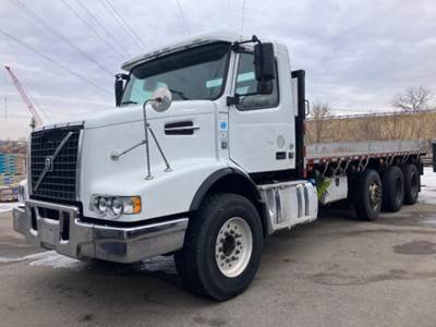 Volvo VHD64B Flatbed Truck