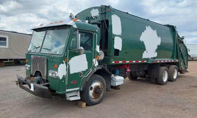 Peterbilt 320 Side Load Garbage Truck