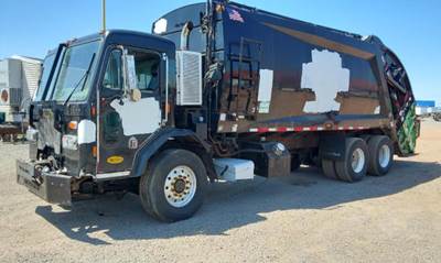 Peterbilt 320 Side Load Garbage Truck