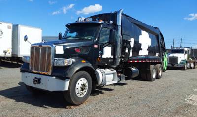 Peterbilt 567 Side Load Garbage Truck