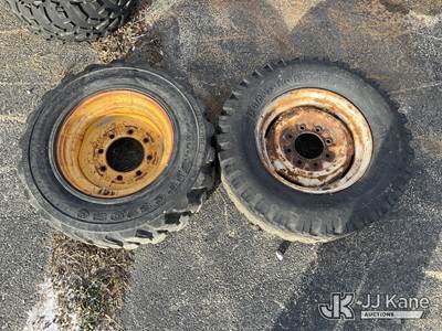 Skid Steer Tires (1) 265/75D16.5NHS & (1) 9.50-16.5LT