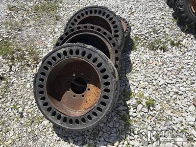 (4) solid tires and steel wheels 39x10-20 tire size. (Used) (Seller States: Need Recapped)
