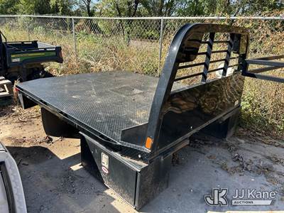 Flatbed off a Ford F450 with toolboxes