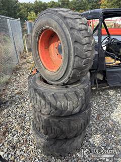 (4) Used Skid Steer Rims with 12-16.5 Tires