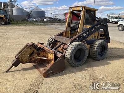 1989 New Holland L555 Rubber Tired Skid Steer Loader