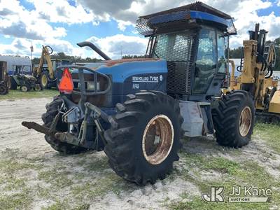 2000 New Holland TV140 Utility Tractor