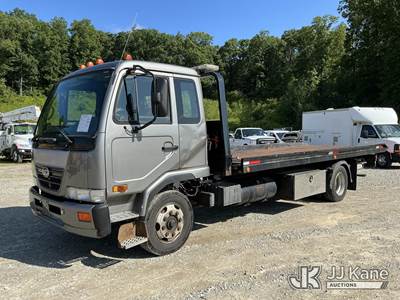 2009 Nissan UD2300 Roll Back Truck