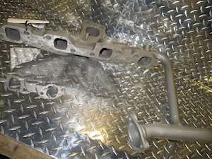Used Isuzu 4HEI Exhaust Manifold W/EGR