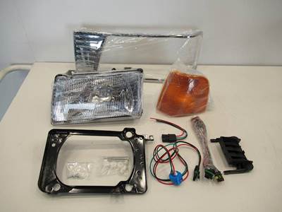 New Aftermarket Peterbilt 377 LH Headlight Assembly w/Chrome Bezel