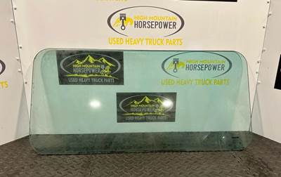 Paccar Back Glass 
Has small scratch see picture
Length: 36 5/16" Height: 17"