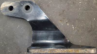 Left side dog ear / engine mount bracket. Bracket is in good used condition, see