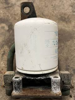 Coolant filter with bracket. Unit is in good used condition, see pictures.