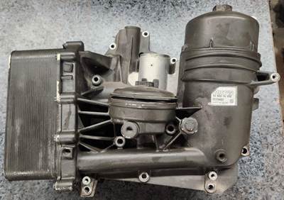 Oil cooler / oil filter pulled from a PACCAR MX13 engine. The oil cooler and