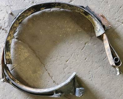 Fuel tank strap and corresponding saddle/bracket with fairing bracket pulled