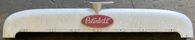 Hood grille crown pulled from a Peterbilt. Unit is in good used condition, see