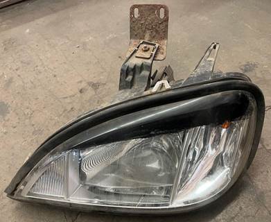 Aftermarket drivers side headlight pulled from a PACCAR truck. Headlight is in