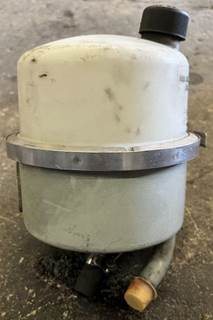 Plastic power steering reservoir pulled from a PACCAR truck. Reservoir is in
