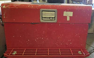 Red Tool Box with step. Locked - no key. Measures 29"L x 16"W x 18"H. Used