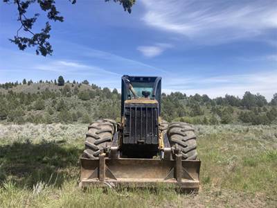 Caterpillar 525 Skidder
