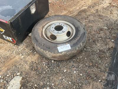 (1) 235/80R16 Tire, Â W/ 8 Lug Dually Rim