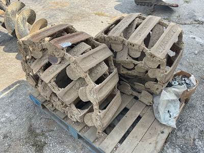 LOEGERING STEEL TRACKS FOR TIRED SKID STEER Skid Steer Attachment