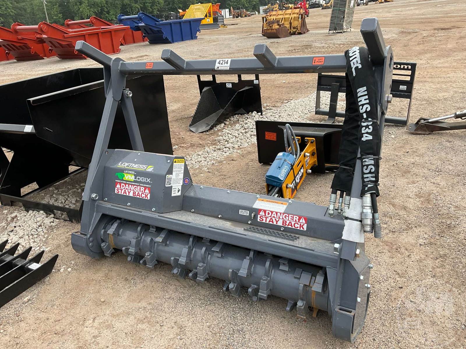 Loftness 61BSLP60D.P BATTLE AXE DRUM MULCHER Skid Steer Attachment For