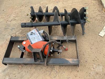 Unused Wolverine Hydraulic Auger Skid Steer Attachment, 35" Depth, 12" & 18" Bits