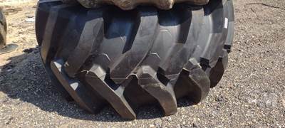 QTY Of (2) 35.5-32 Skidder Tires, Deere Swede Rims, Dueling Plates, (1) New &