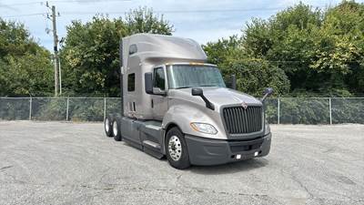 International LT Sleeper Semi Truck - 73" Raised Roof, Cummins, Automatic, Battery Powered HVAC with Optimized Idle
