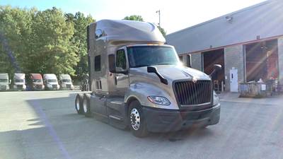 International LT Sleeper Semi Truck - 73" Raised Roof, Cummins, Automatic, Battery Powered HVAC with Optimized Idle
