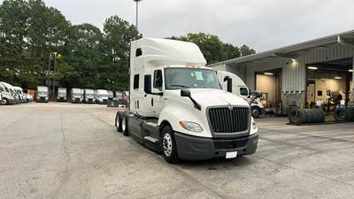 International LT Sleeper Semi Truck - 73" Raised Roof, Cummins, Automatic, Battery Powered HVAC with Optimized Idle