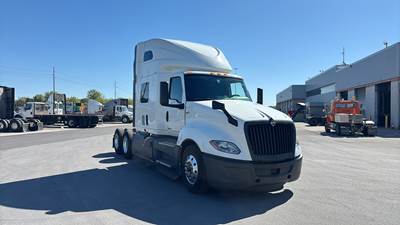 International LT Sleeper Semi Truck - 73" Raised Roof, Cummins, Automatic, Battery Powered HVAC with Optimized Idle