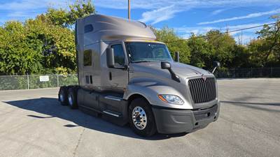 International LT Sleeper Semi Truck - 73" Raised Roof, Cummins, Automatic, Battery Powered HVAC with Optimized Idle