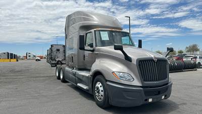 International LT Sleeper Semi Truck - 73" Raised Roof, Cummins, Automatic, Battery Powered HVAC with Optimized Idle