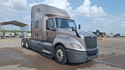International LT Sleeper Semi Truck - 73" Raised Roof, Cummins, Automatic, Battery Powered HVAC with Optimized Idle