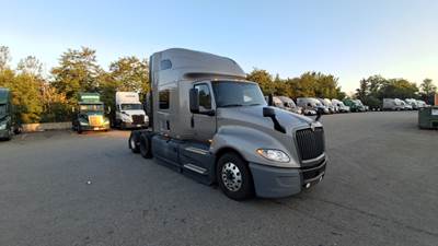 International LT Sleeper Semi Truck - 73" Raised Roof, Cummins, Automatic, Battery Powered HVAC with Optimized Idle