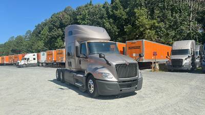 International LT Sleeper Semi Truck - 73" Raised Roof, Cummins, Automatic, Battery Powered HVAC with Optimized Idle