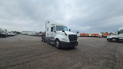 International LT Sleeper Semi Truck - 73" Raised Roof, Cummins, Automatic, Battery Powered HVAC with Optimized Idle