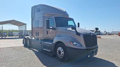 International LT Sleeper Semi Truck - 73" Raised Roof, Cummins, Automatic, Battery Powered HVAC with Optimized Idle